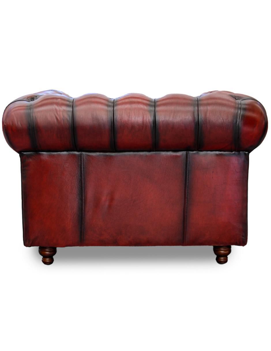 Sillón Confortopiel Chesterfield estilo clásico renovado de madera pino